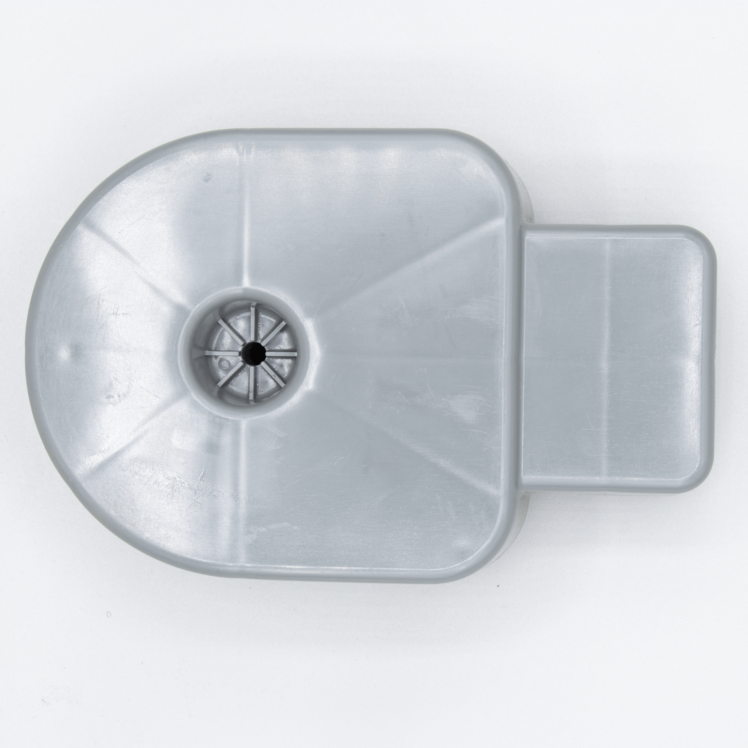 Gray plastic part with central hole.