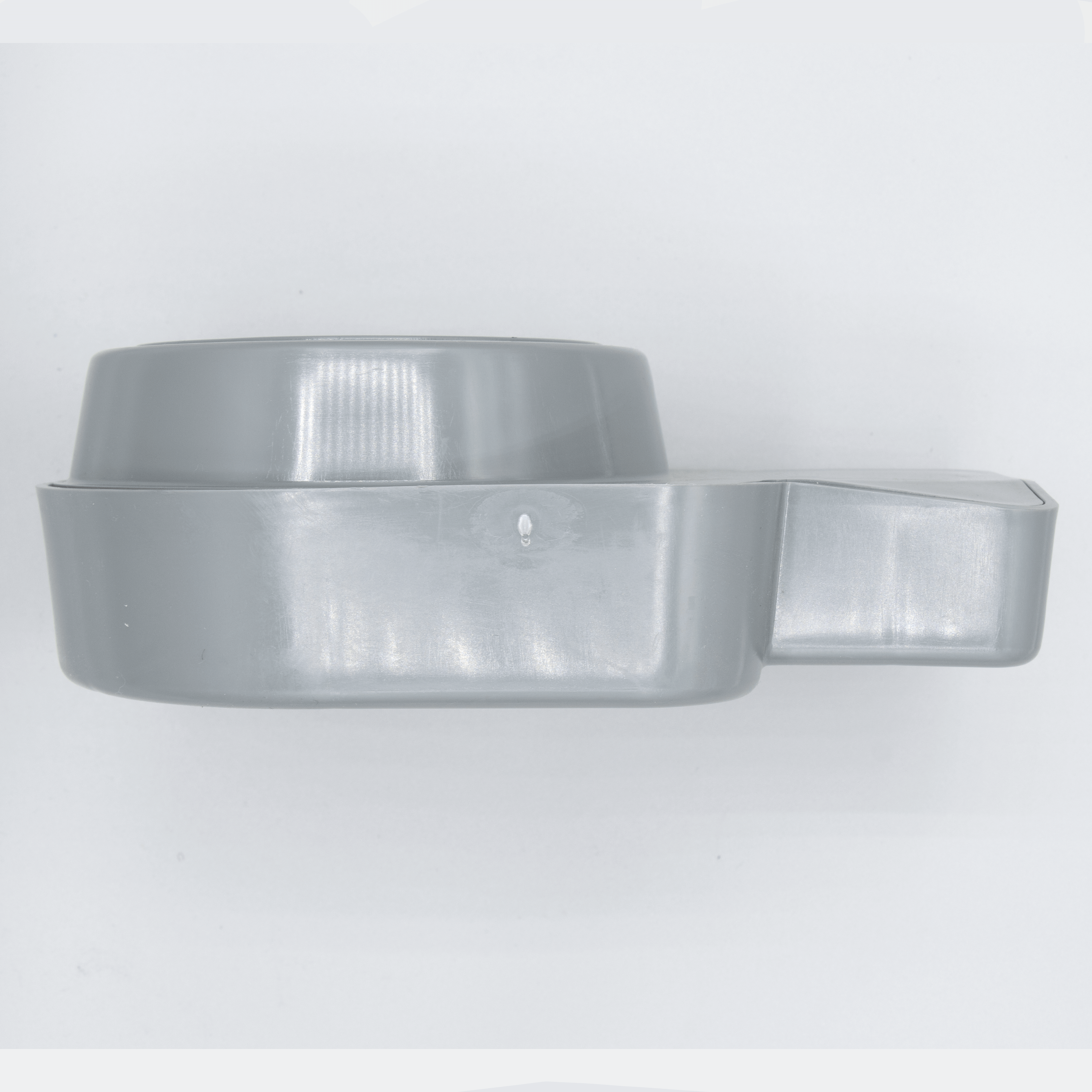 Gray plastic engine cover part.