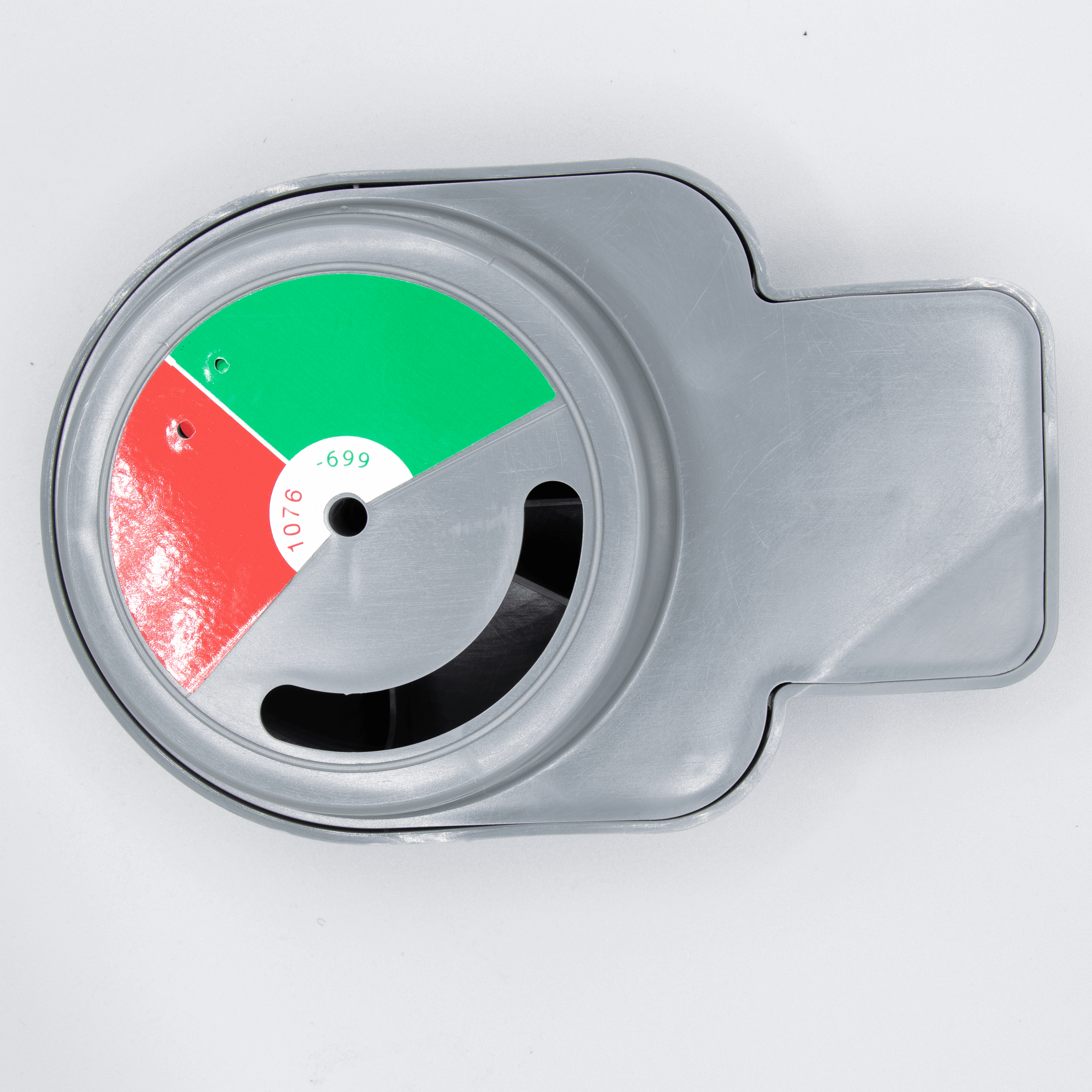 Gray plastic spool with color-coded sections.