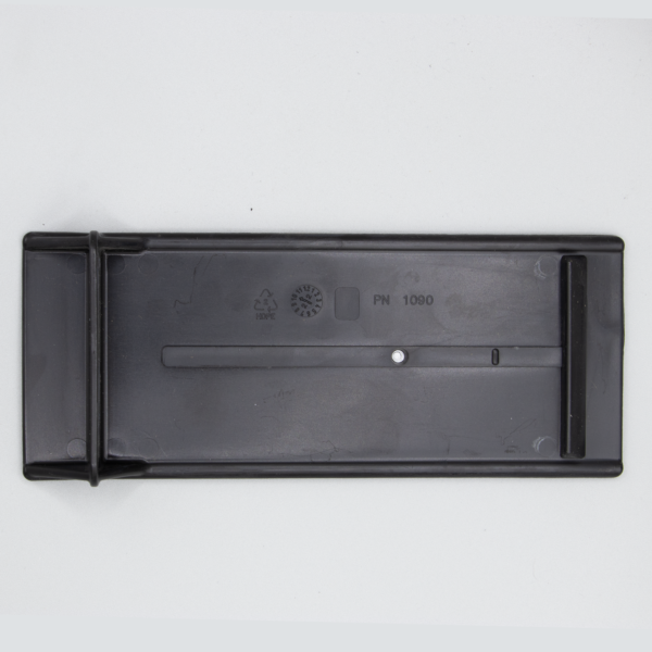 Black plastic part PN 1090.