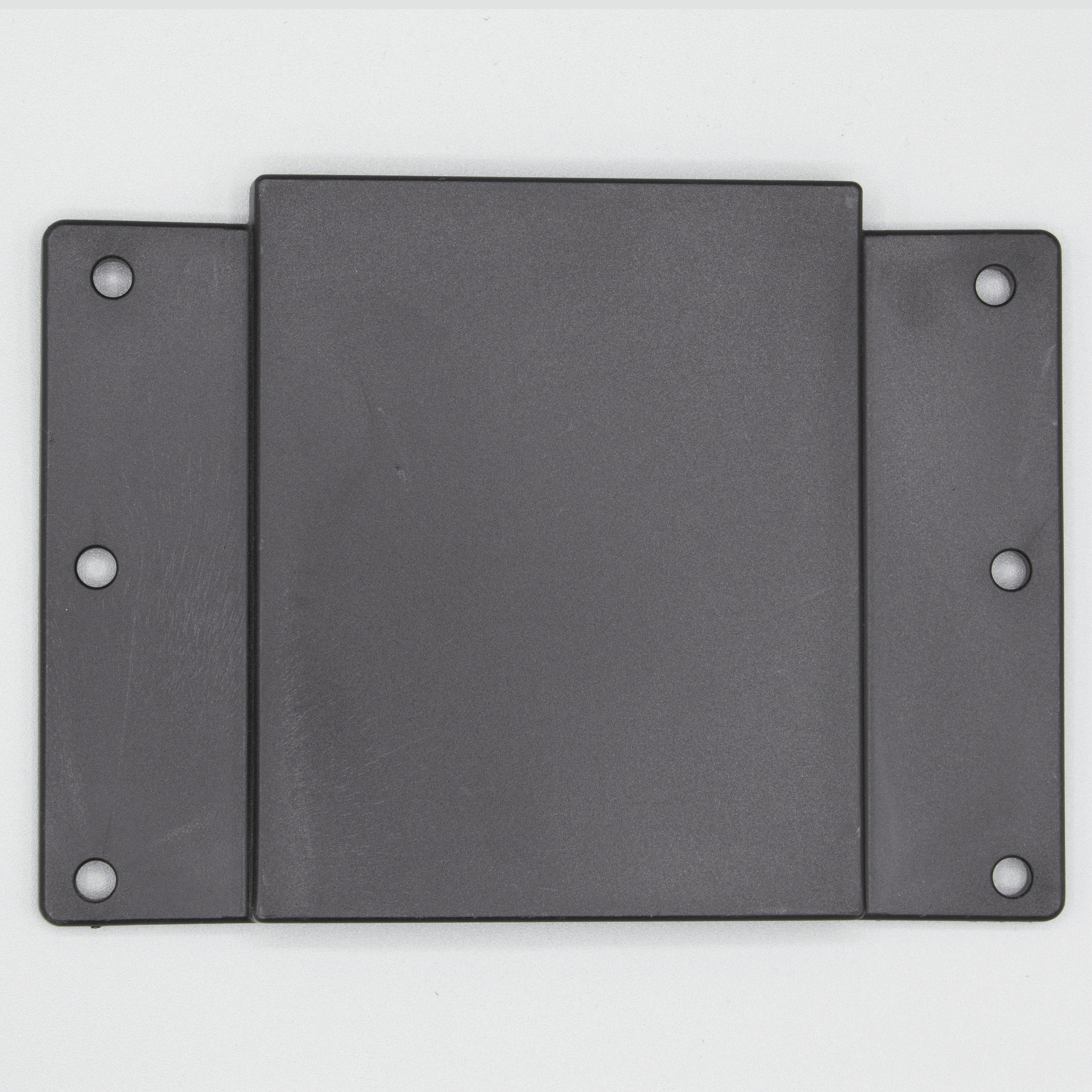 Black plastic mounting bracket with holes.