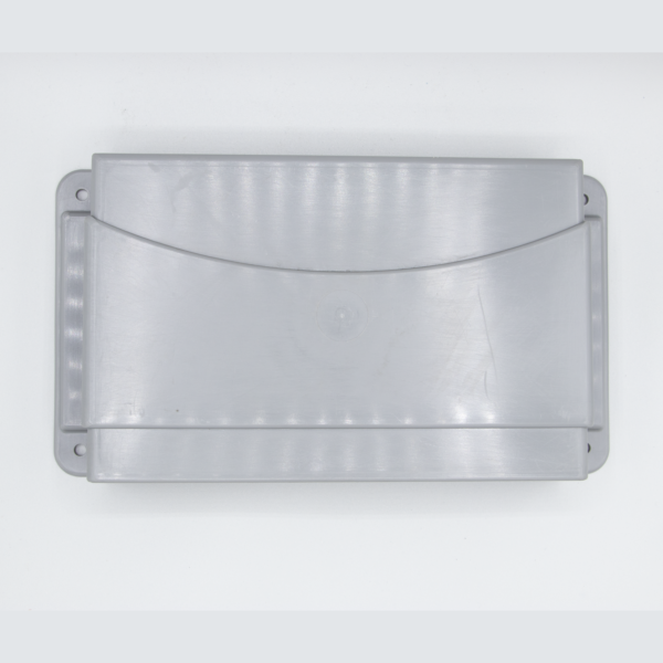 Gray plastic rectangular box with a curve.