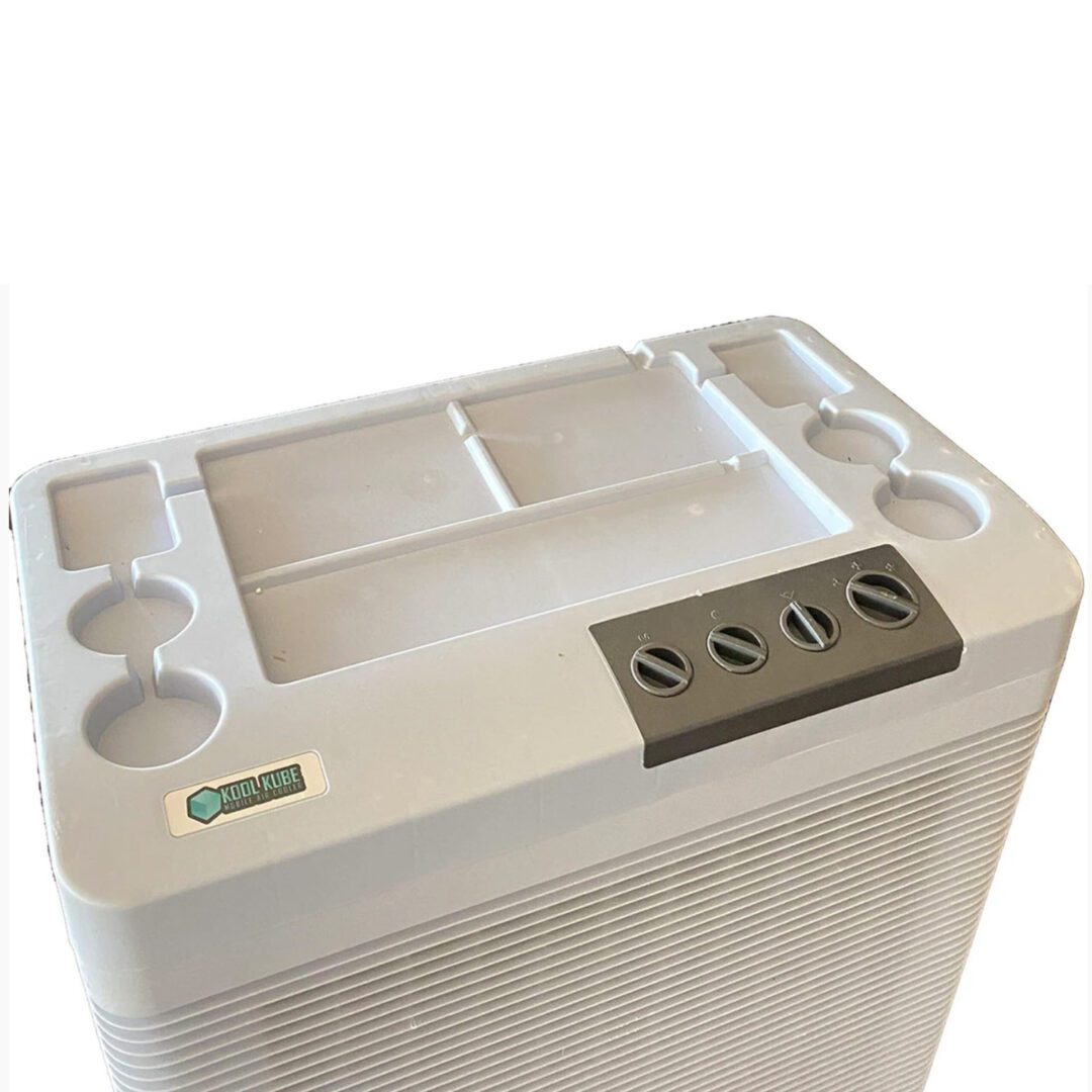 White portable air conditioner with controls.