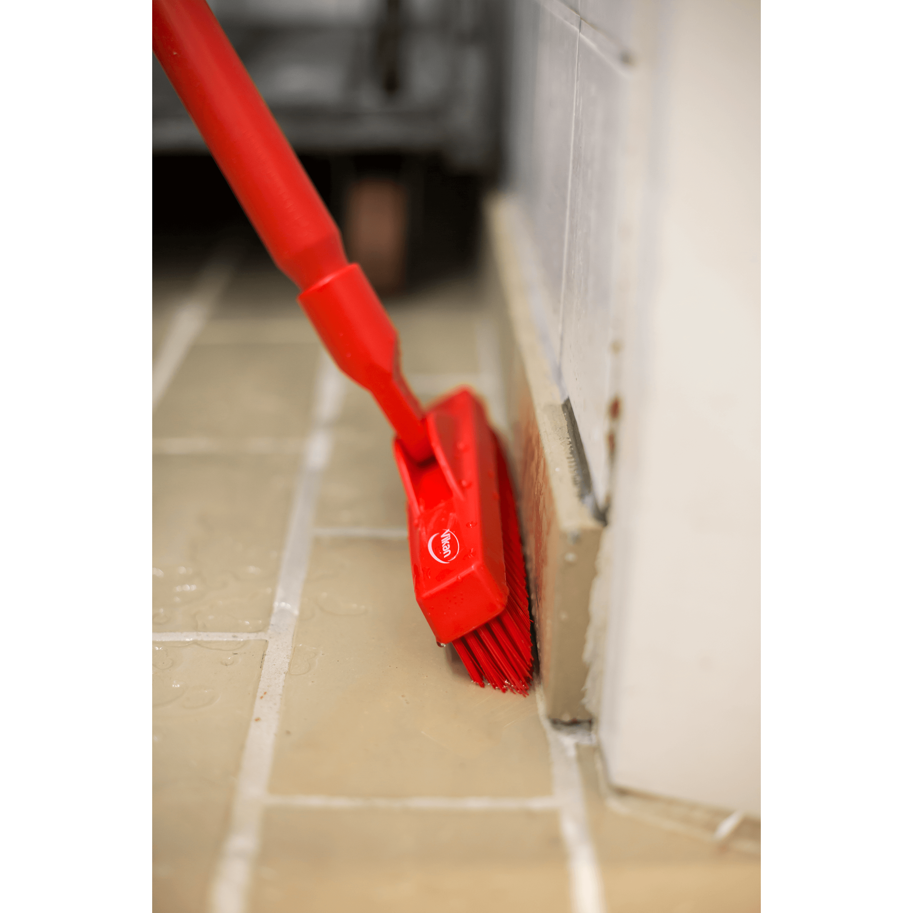 29604-4 Red brush cleaning tile grout.