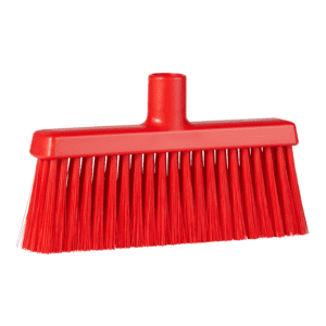 Red plastic broom with stiff bristles.