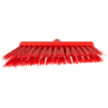 Red plastic broom with stiff bristles.