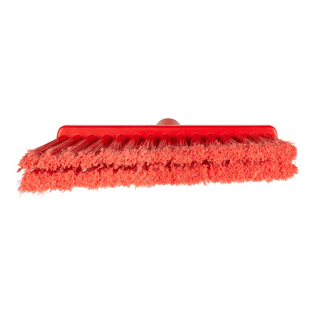 Red plastic broom with bristles.