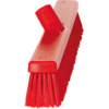 Red plastic broom with long bristles.