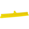 Yellow plastic broom with stiff bristles.