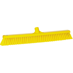 Yellow plastic broom with stiff bristles.