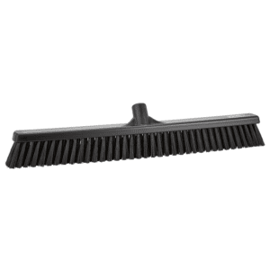 Black push broom with stiff bristles.