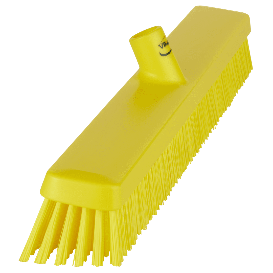 Yellow plastic scrub brush with handle.