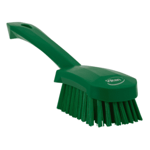 Green cleaning brush with sturdy bristles.