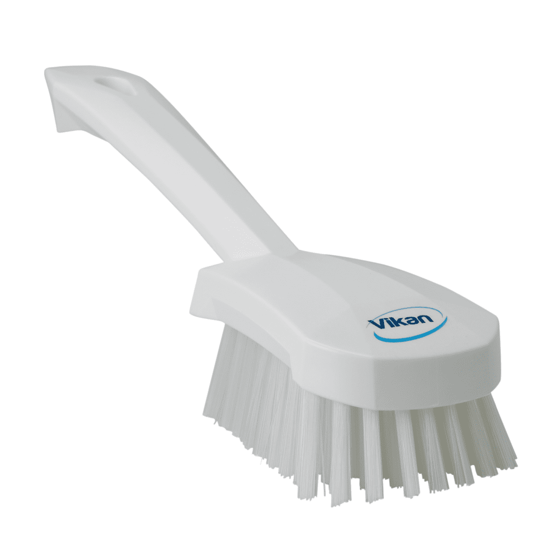 White cleaning brush with sturdy bristles.